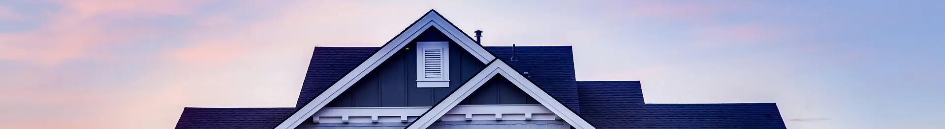 House roof top showing a Shingle style roofing tile.